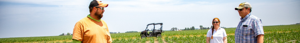 People in a farm field - credit Iowa NRCS