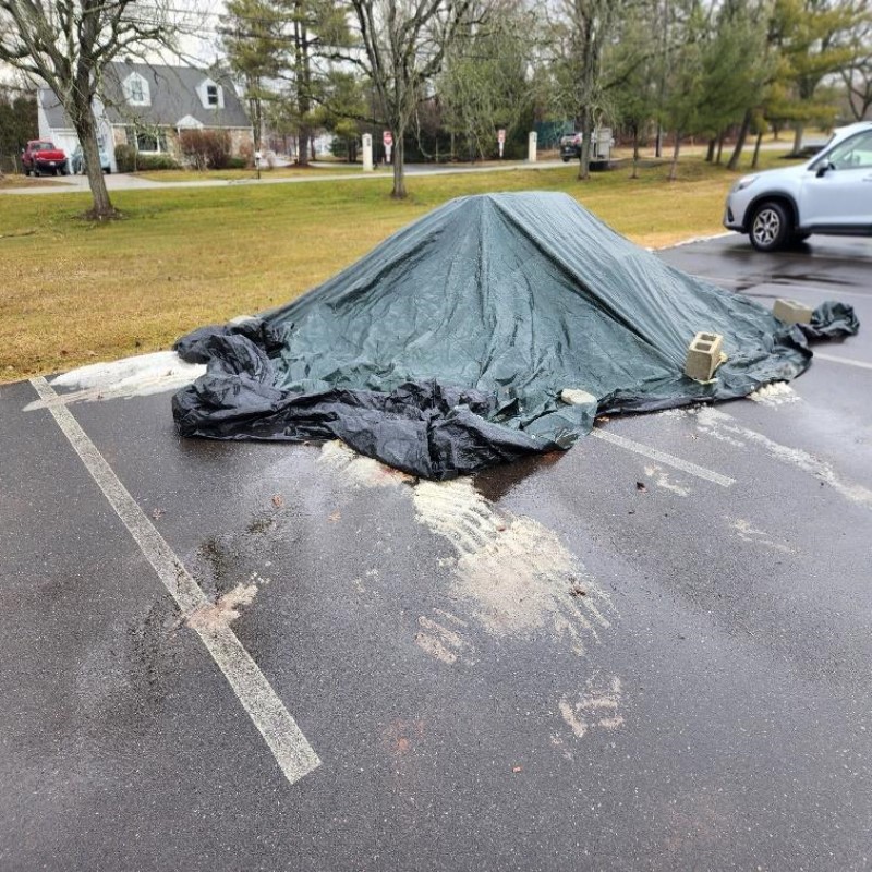 Salt escaping from under a tarp - credit Charlie Karl