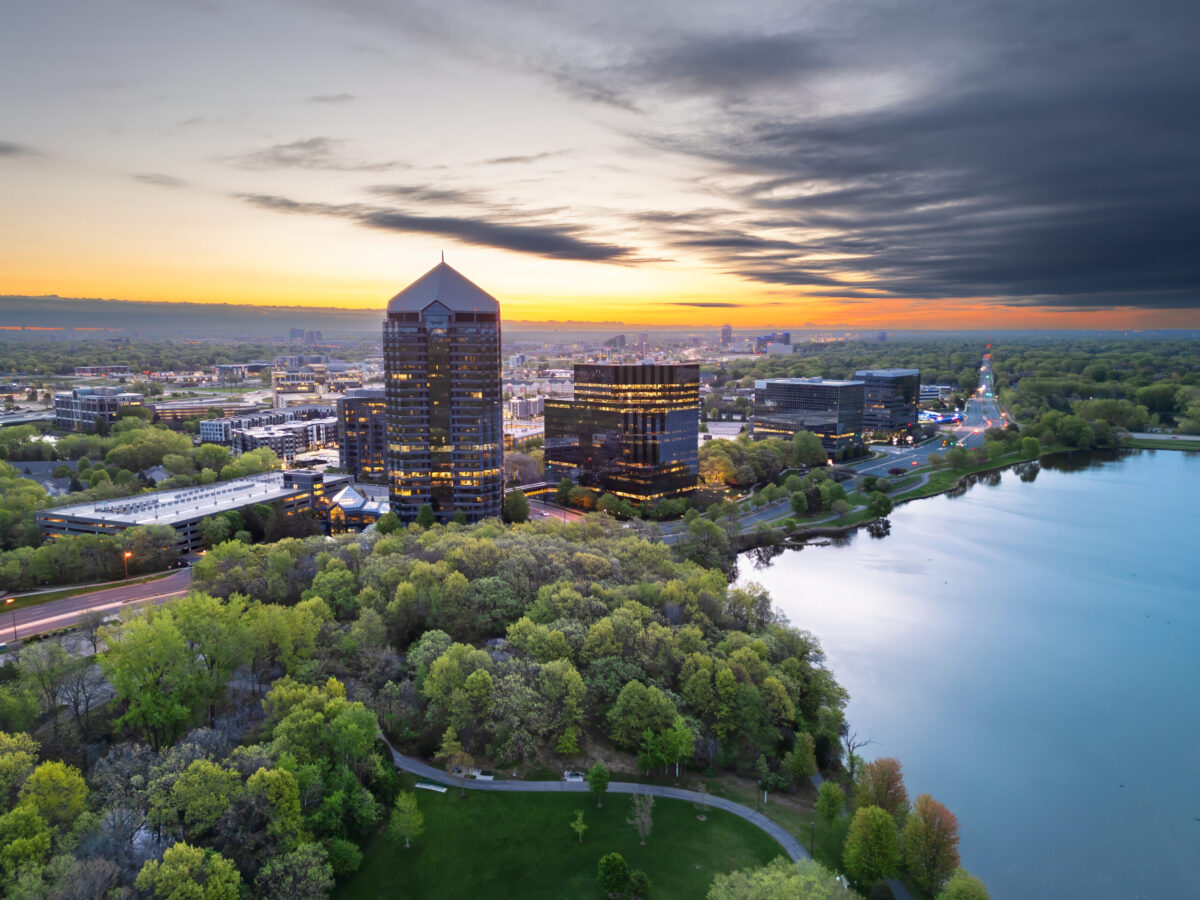 Bloomington, Minnesota, cityscape on Lake Normandale at dawn.