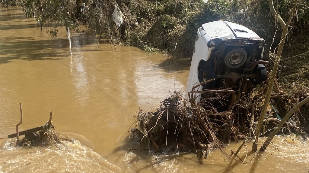 Submerged Van in the Swannanoa River near Biltmore Village after Hurricane Helene in Asheville, North Carolina