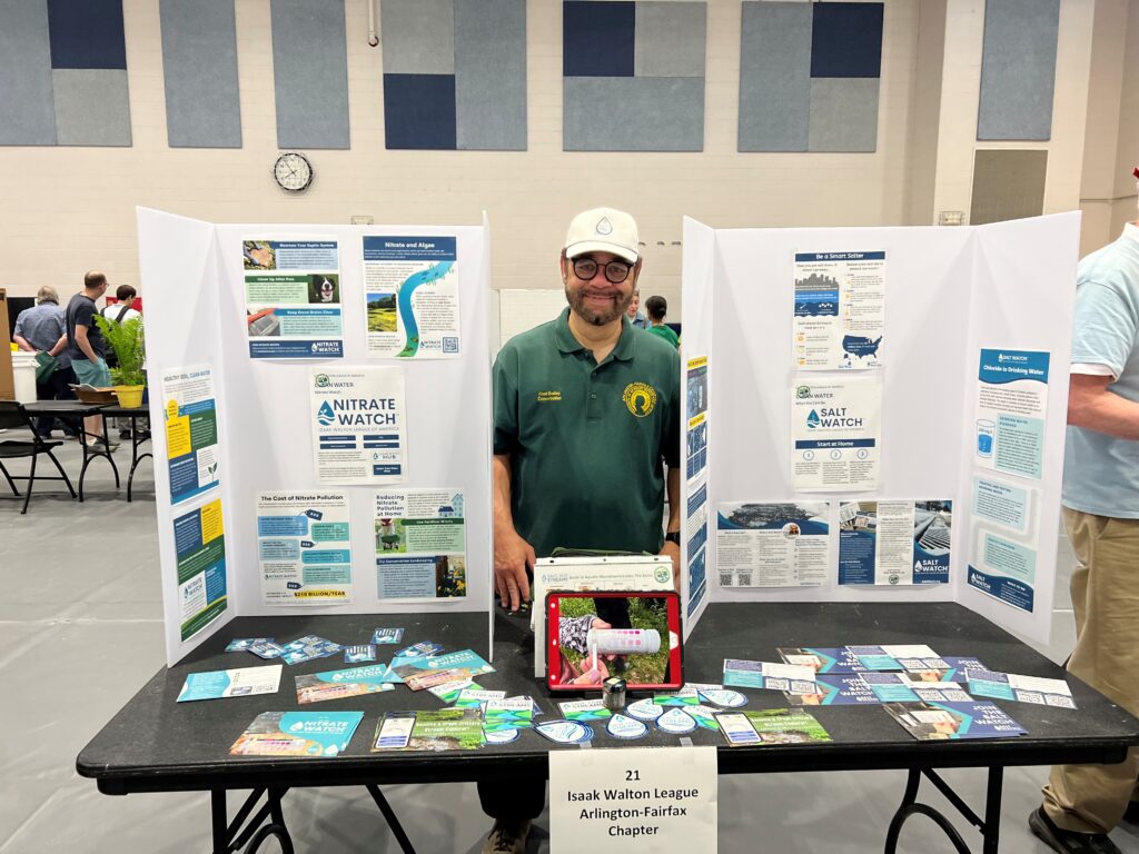 Fred Bailey displays information about SOS programs at a community event.