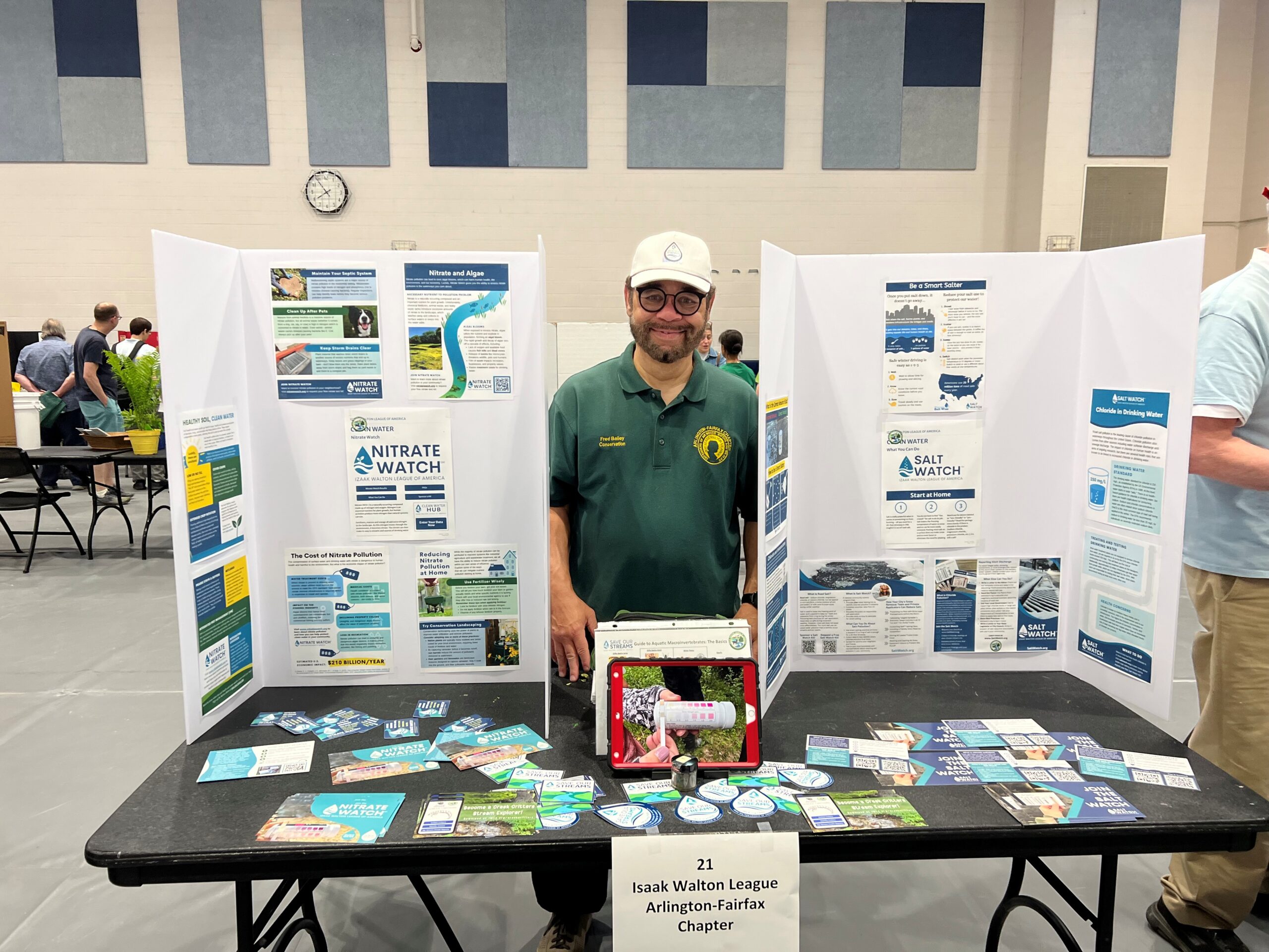 Fred Bailey displays information about SOS programs at a community event.